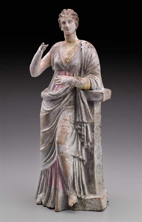 statuette of aphrodite or a muse leaning on a pillar ancient greek art