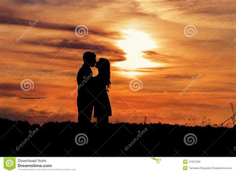 Beautiful Shade Loving Happy Couple Kissing At Sunset In A