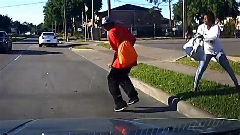 Shocking Moment Woman Pushes Man Into Path Of Oncoming Car As Driver