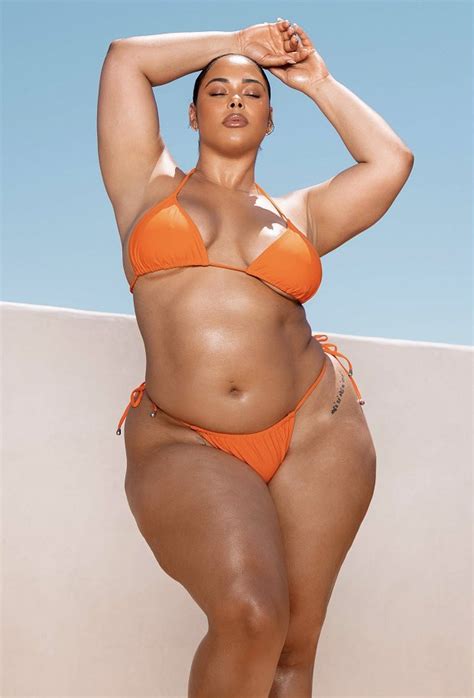 Tabria Posing In Her Orange Bikini Cufo510