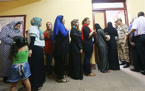 Egyptians Wait To Cast Their Vote Inside A Polling Station