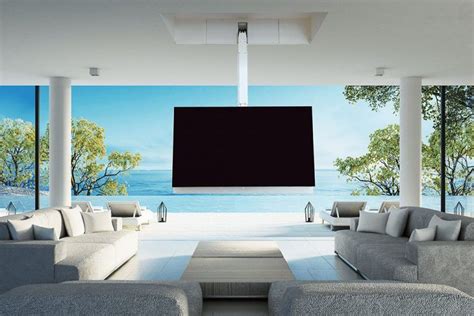 living room filled  furniture   flat screen tv mounted   wall