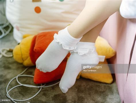 Feet Of Teenage Girl In Frilly Socks Photo Getty Images