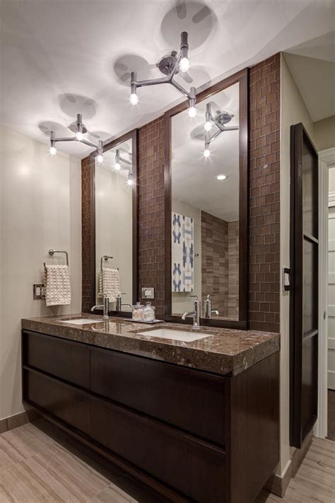 modern bathroom features stunning futuristic lighting double vanity hgtv
