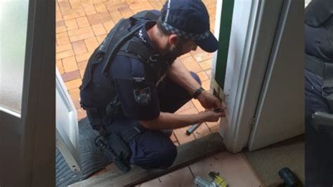 Qld Police Officers Go Viral After Helping Elderly Woman Repair Damaged
