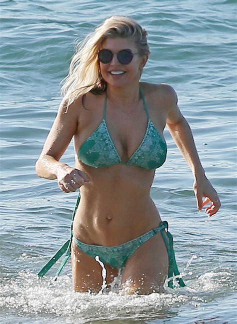 fergie flaunts rock hard abs and epic cleavage in baywatch