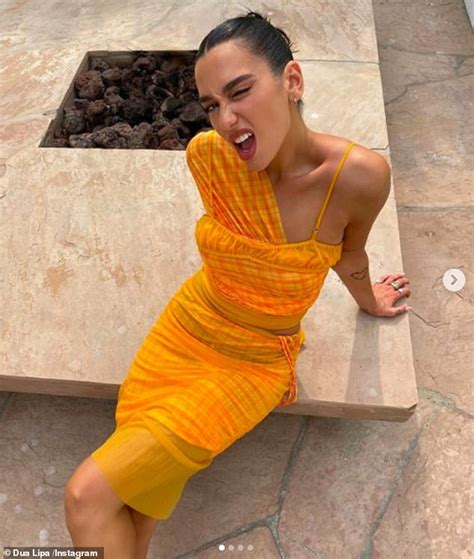 Dua Lipa Puts On A Sizzling Display In A Strappy Orange Co Ord For 25th