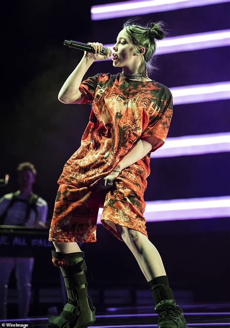 billie eilish performs  stage  barcelona wearing therapeutic boot