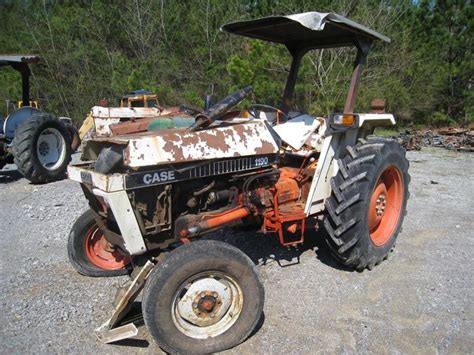 tractor sitting  top   gravel road