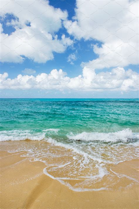 blue sea water cloudy sky sand beach nature stock  creative