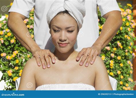 Female Receiving Shoulder Massage Stock Image Image Of Massaging