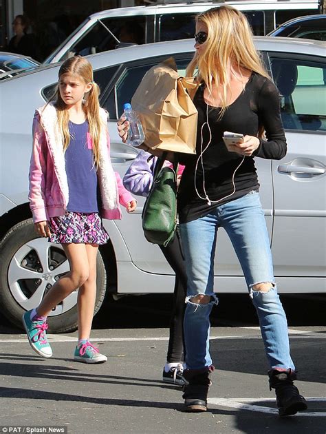 denise richards steps out for shopping trip with daughters sam and lola daily mail online