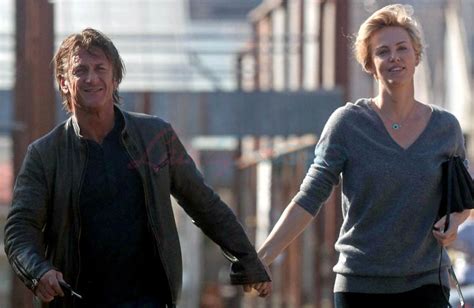 charlize theron and sean penn holding hands smiling and skipping lainey gossip entertainment