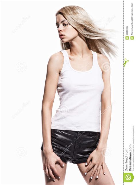 Portrait Of Beautiful Blonde In Leather Short Stock Image