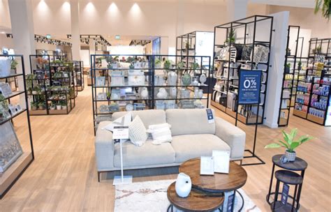 expands manchester store   home department big furniture