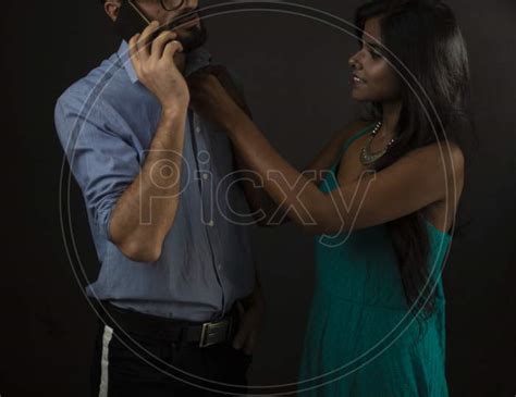 Image Of Romantic Daily Life Interaction Of A Dark Skinned Indian