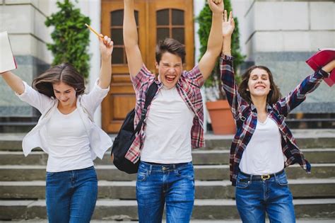 excited students leaving university photo