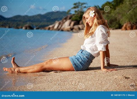 Beautiful Girl In Sea Style Sitting On Sand Travel And Vacation