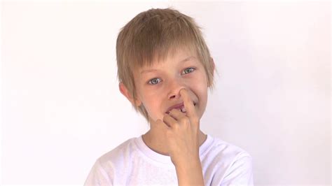 boy picks nose stock footage sbv  storyblocks