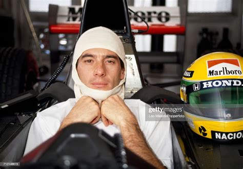 Formula One Driver Ayrton Senna Of Brazil Pictured Sitting In The