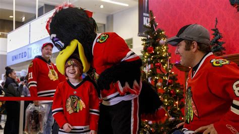 blackhawks mascot tommy hawk doesn t take a night off after getting