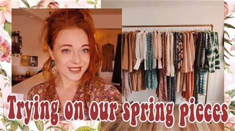 trying on clothes from our spring launch youtube