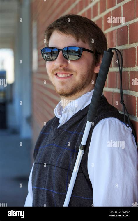 young blind man   cane stock photo alamy
