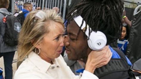social media reacts to florida coach s wife kissing every player as