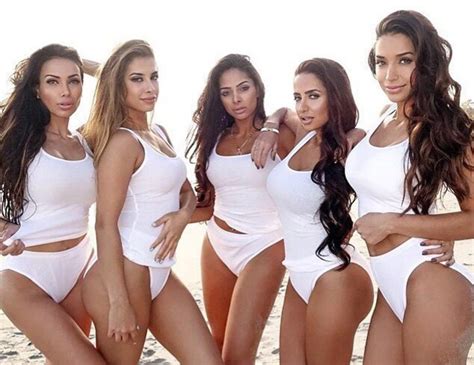 medic accused of romping with footie star samir nasri strips off with four of her sisters