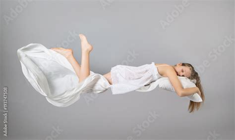 Sleeping Girl Flying In A Dream White Linen Flying Through The Air