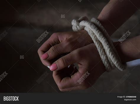 female hands tied rope image and photo free trial bigstock
