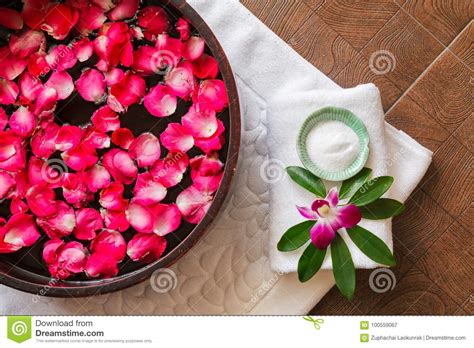 spa pedicure treatment  foot bath  bowl red rose petals orchid