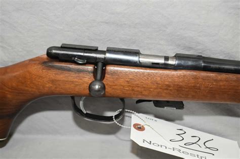 remington model   lr cal mag fed bolt action rifle   bbl blued finish  slight marks