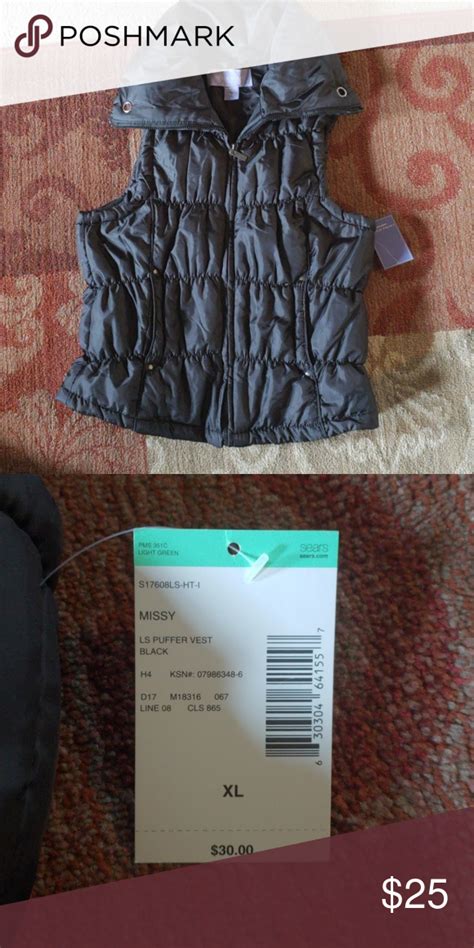 black puffer vest never worn not a vest kinda gal says xl but could fit as a large easily