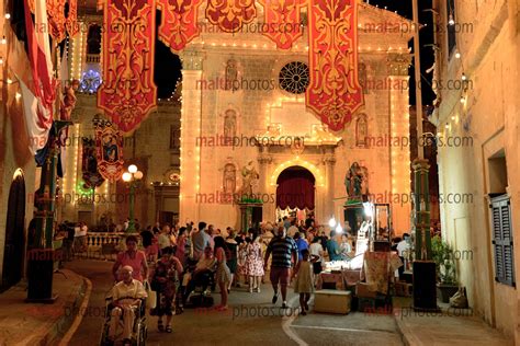 attard feast parish church festa bandalori banners people malta