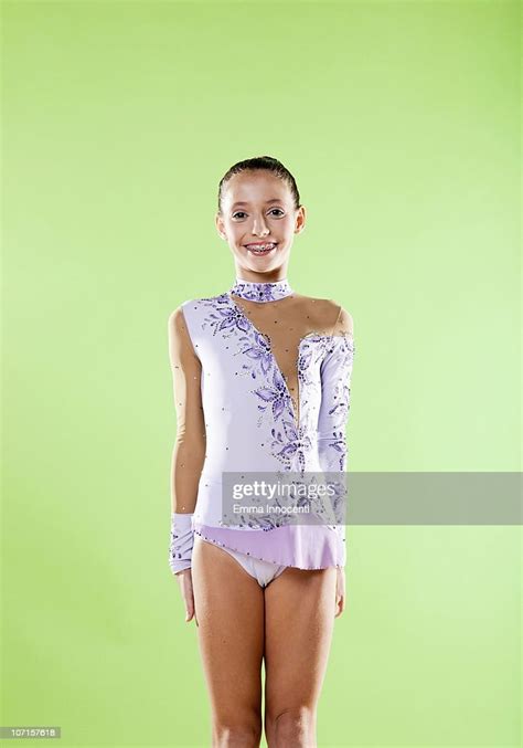 gymnast smiling purple leotard photo getty images