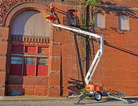 reach higher   easy   towable boom lift compact