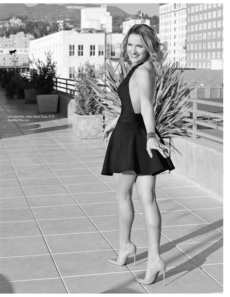shantel vansanten and her gorgeous legs in a sexy halter dress and pumps prancing on the terrace