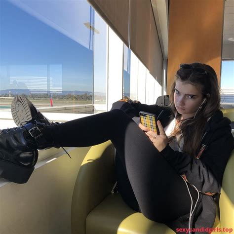 sexycandidgirlstop teen girl  leggings  boots sitting  legs   windowsill item