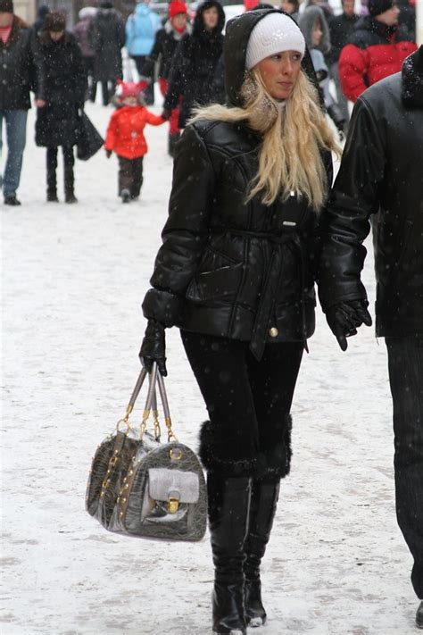 sexy blonde russian lady in winter prague in high shiny l