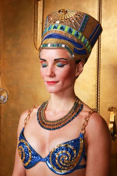 Beautiful Thin Egyptian Woman With Pronounced Cheekbones In A Huge Gold