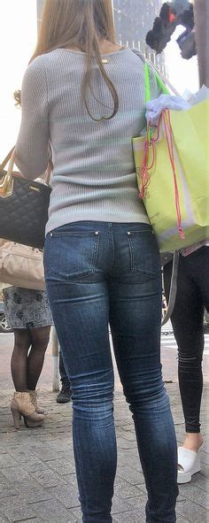 Eva Notty Wearing A Blue Jeans Rear View Milf Busty