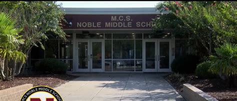 middle school principal found dead after arrest for