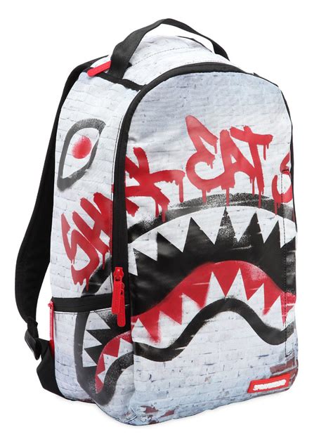 sprayground shark eat shark backpack  red lyst