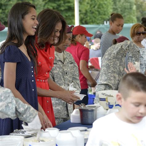 first lady michelle obama and her daughters through the