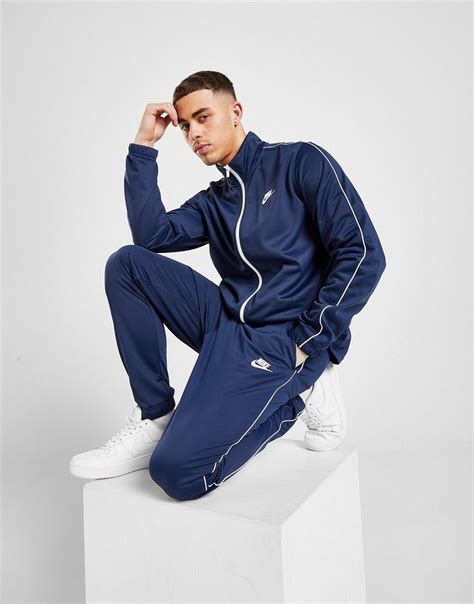 koop blauw nike poly trainingspak heren jd sports