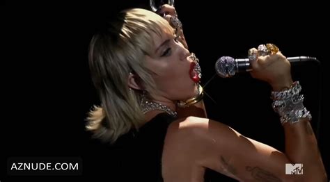 miley cyrus in a throwback to her racy wrecking ball video