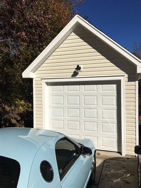 adding  single car garage justham custom homes