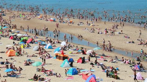 people   beach sunbathing  swimming enjoying  vacation famous beach  bol