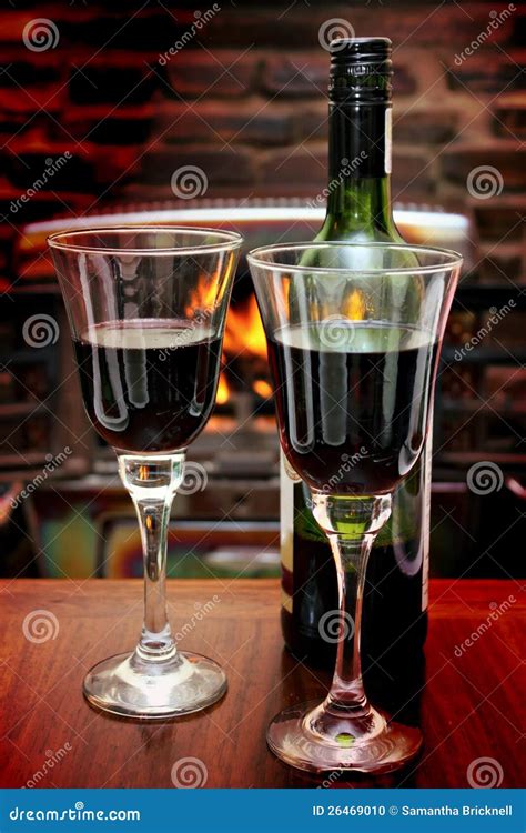 wine   fire stock photo image  warm wine glasses